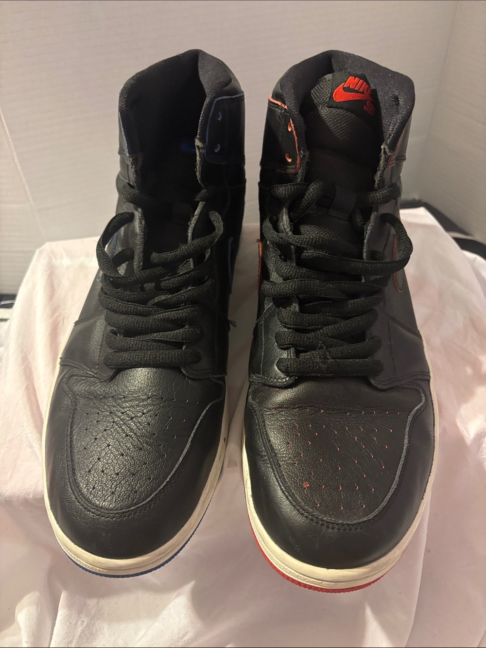 Nike Black High-Top Sneakers with Red and Blue Accents